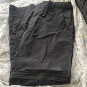 Men's Black Northface pants.